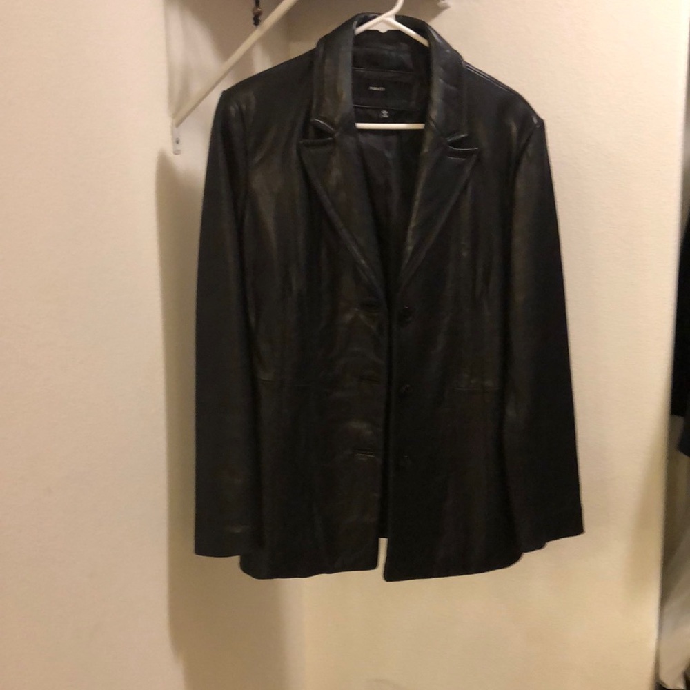 Women’s black leather jacket.